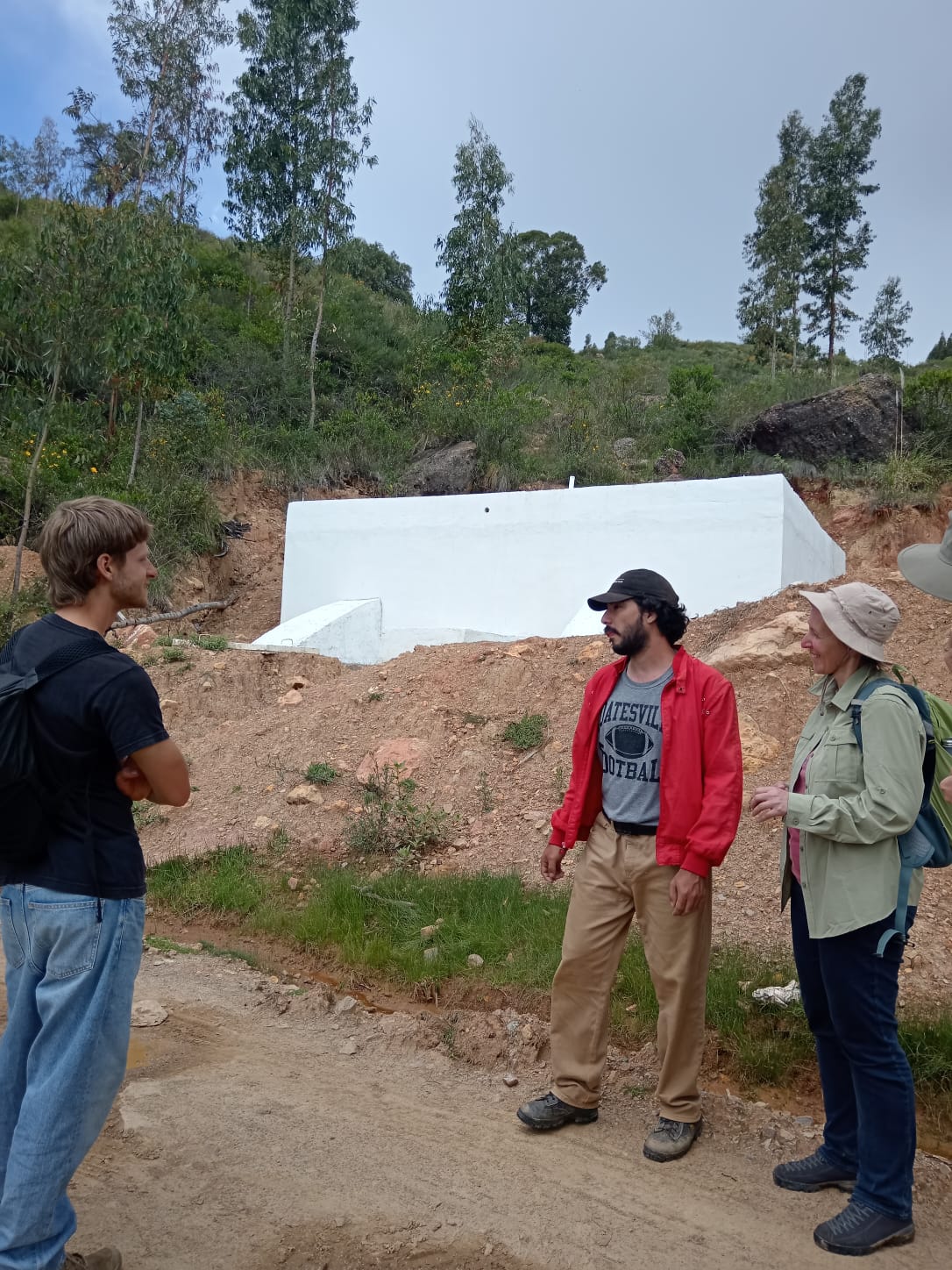 Visitors visiting the water storage tank on the property